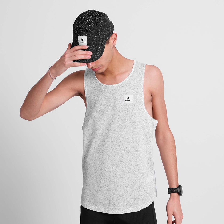 Front view of a model wearing the SAYSKY Unisex Universe Combat Cap in the Black Universe colourway.