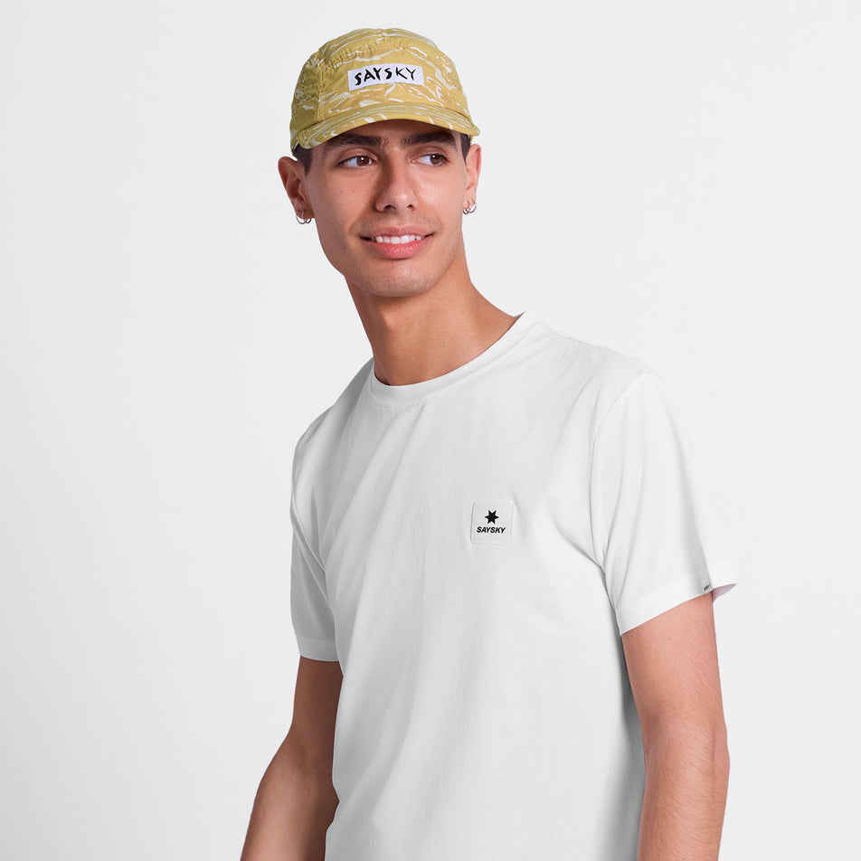 Front view of a model wearing the SAYSKY Unisex Tiger Combat Air Cap in the Yellow colourway.