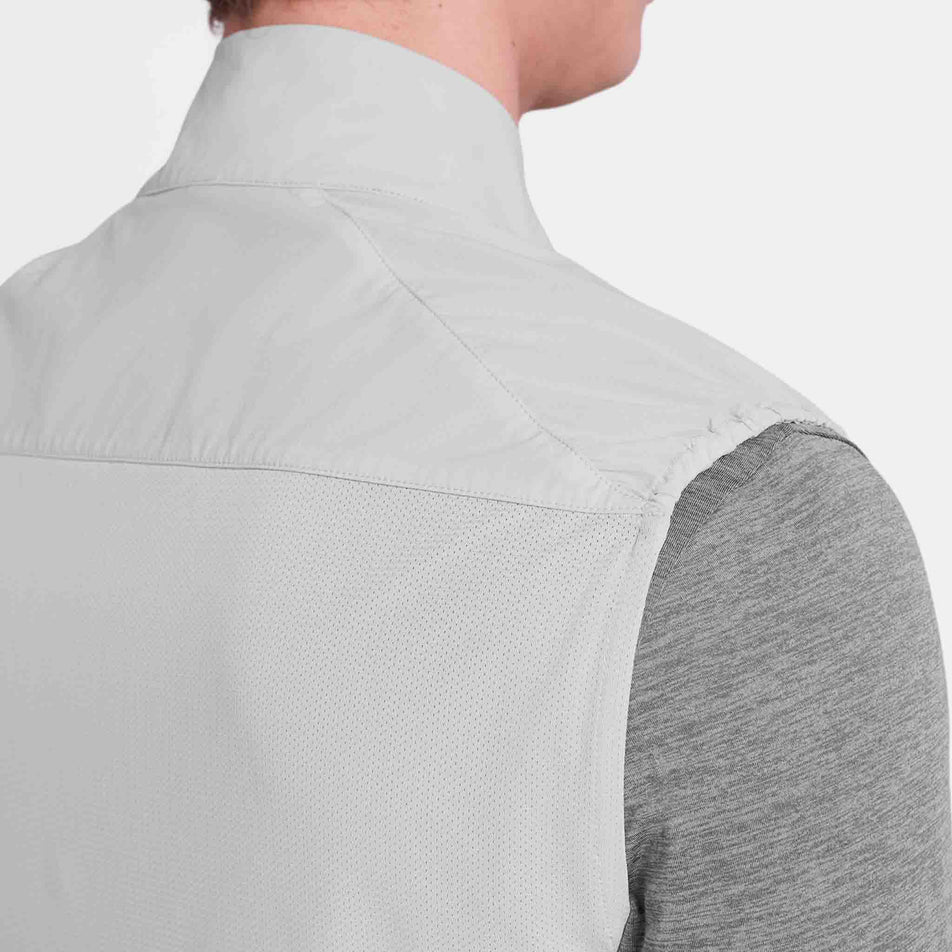 Back view of a model wearing the SAYSKY Unisex Clean Pace Flex Vest in the Grey colourway. 
