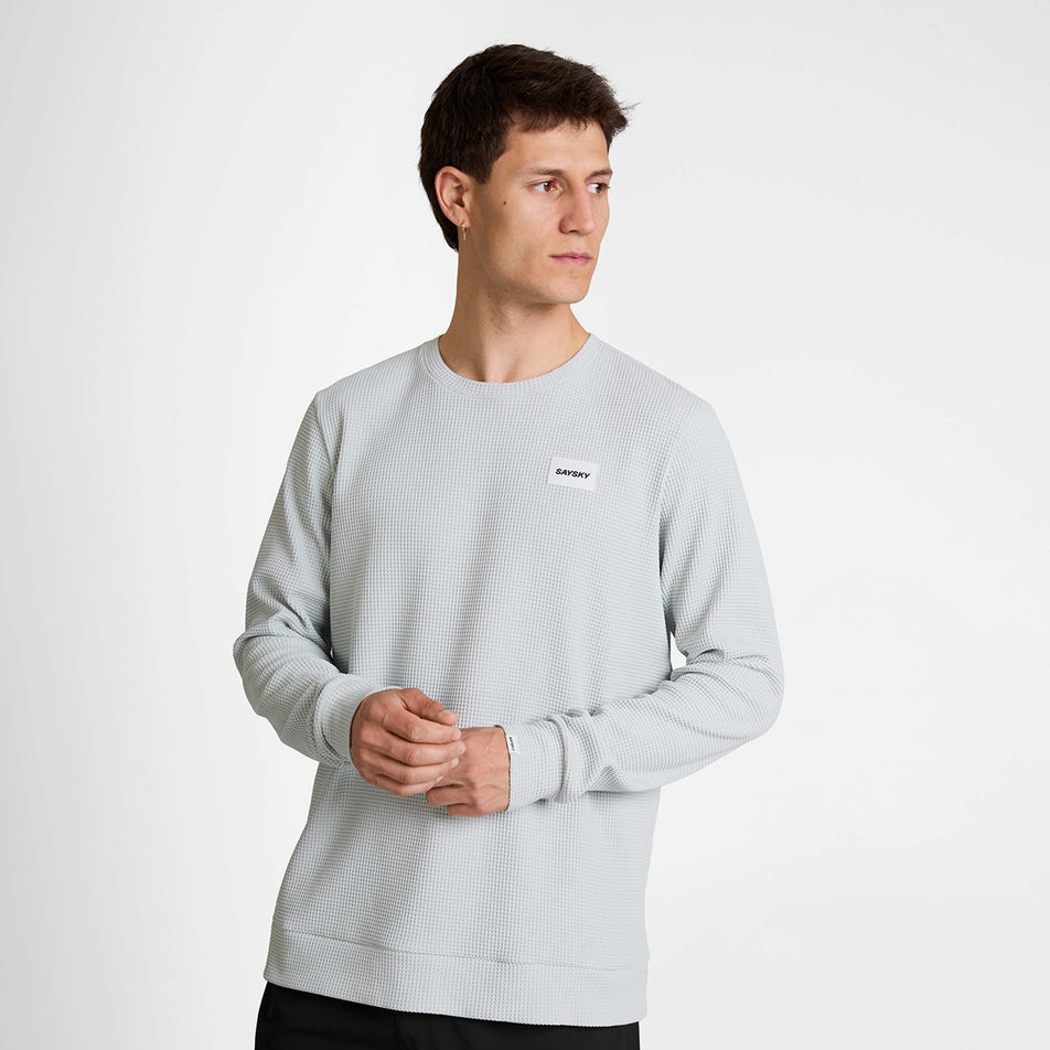Front view of a model wearing the SAYSKY Men's Motion Waffle Long Sleeve in the Grey colourway.