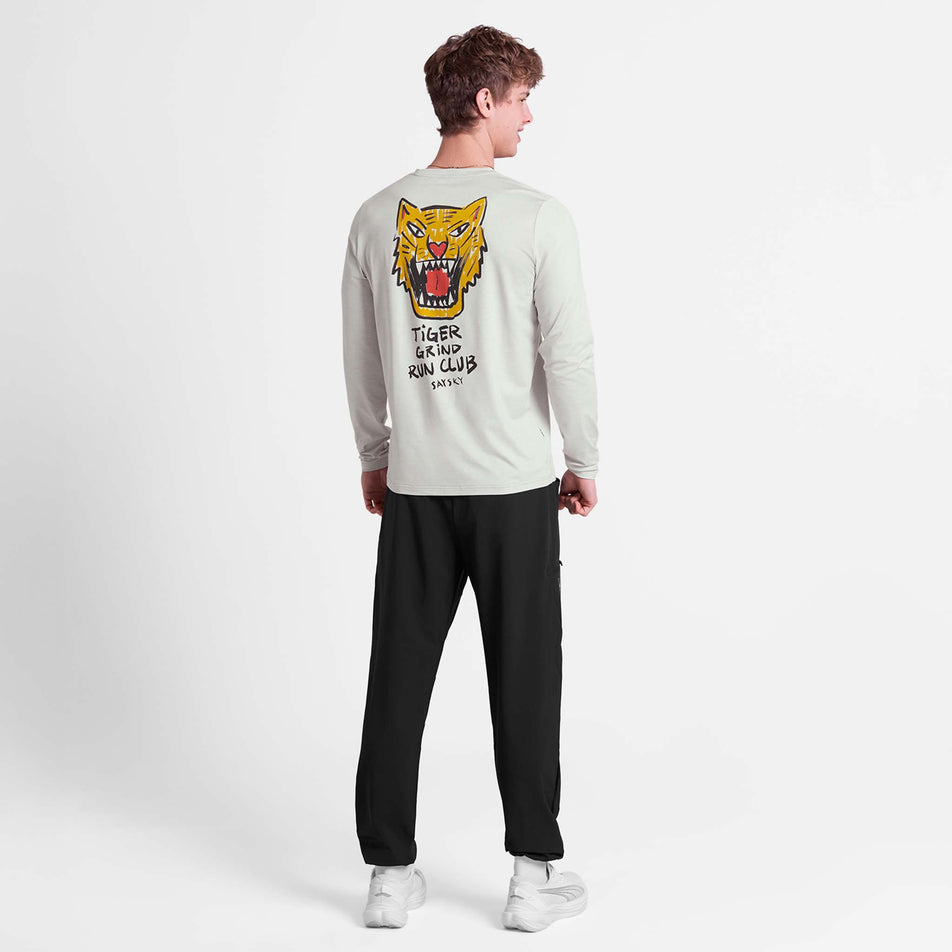 Back view of a model wearing the SAYSKY Men's Tiger Pace Long Sleeve in the Grey colourway. 