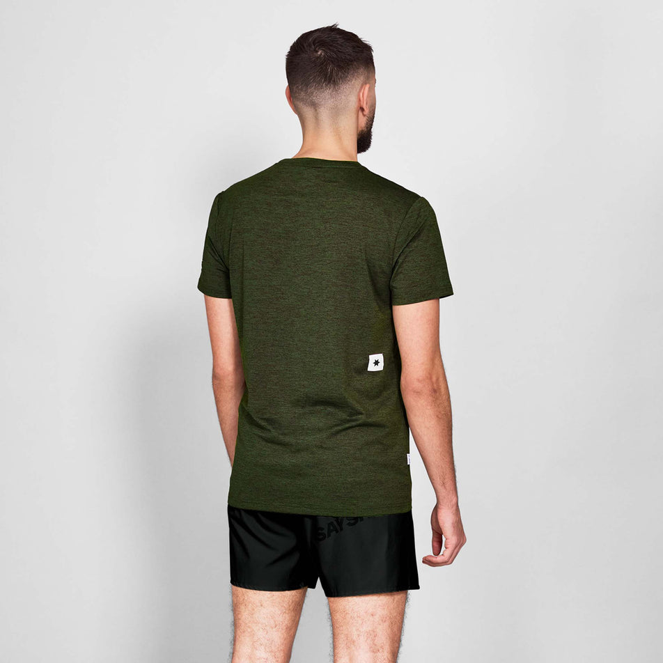Back view of a model wearing the SAYSKY Men's Clean Pace T-Shirt in the Green colourway.