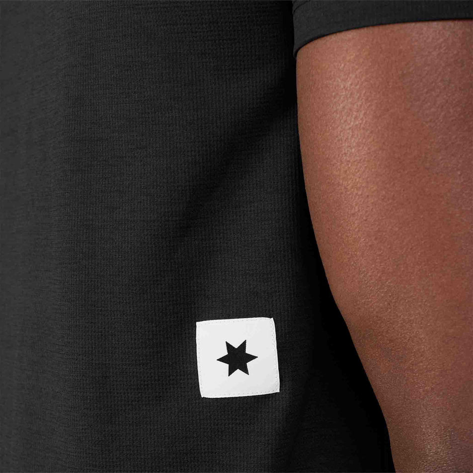 Close-up view of the SAYSKY star on the back of the SAYSKY Men's Clean Combat Pro T-Shirt in the Black colourway.