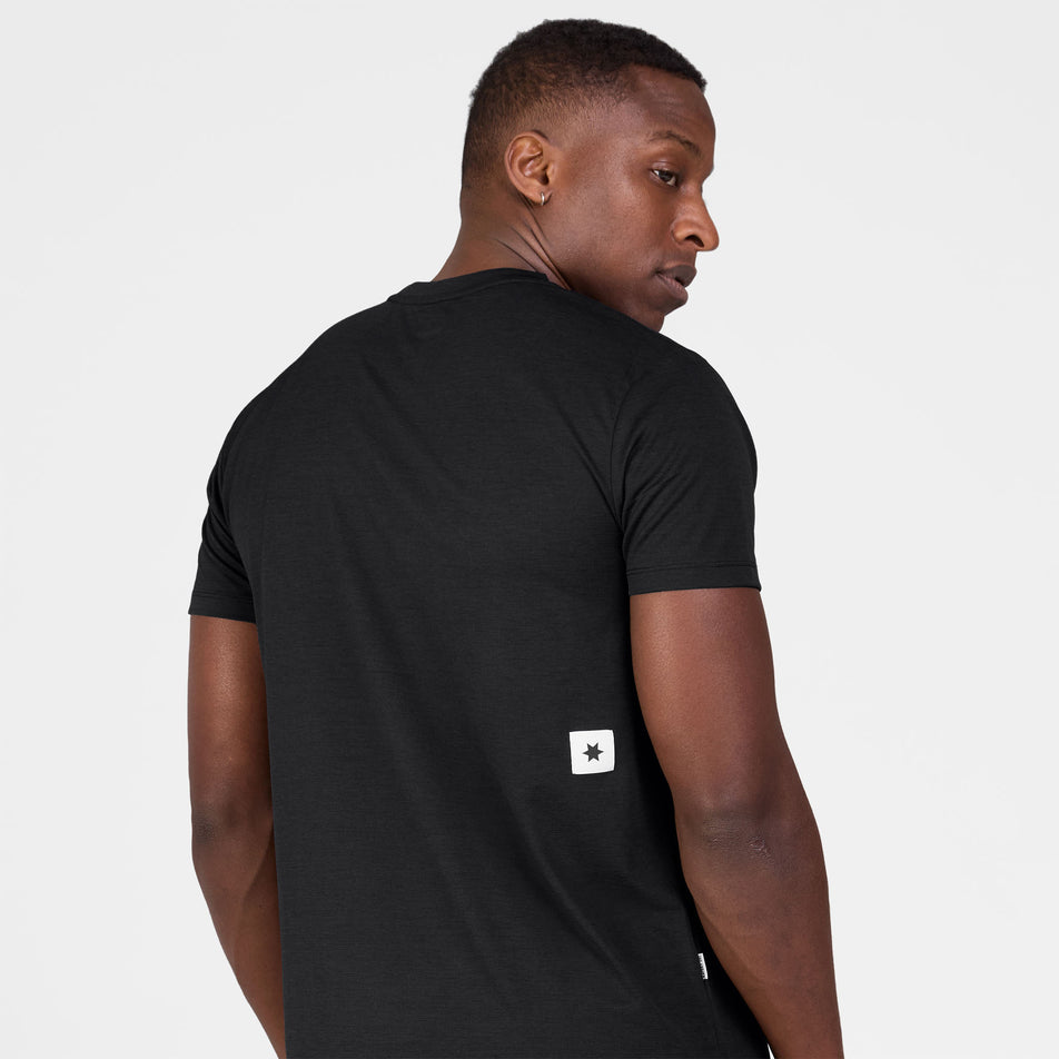 Back view of a model wearing the SAYSKY Men's Clean Combat Pro T-Shirt in the Black colourway.