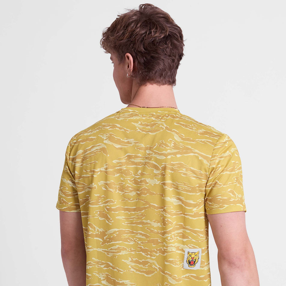Back view a model wearing the SAYSKY Men's Tiger Combat T-Shirt in the Yellow colourway.