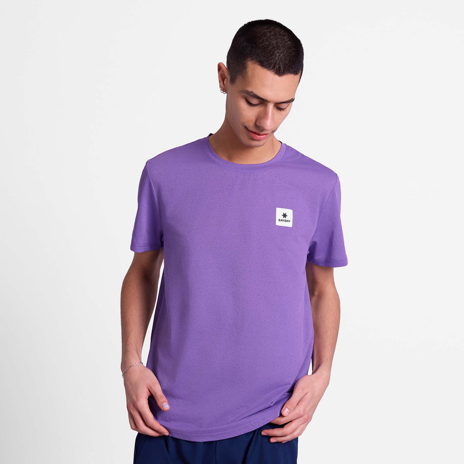 Front view of a model wearing the SAYSKY Men's Universe Combat T-Shirt in the Purple Universe colourway.