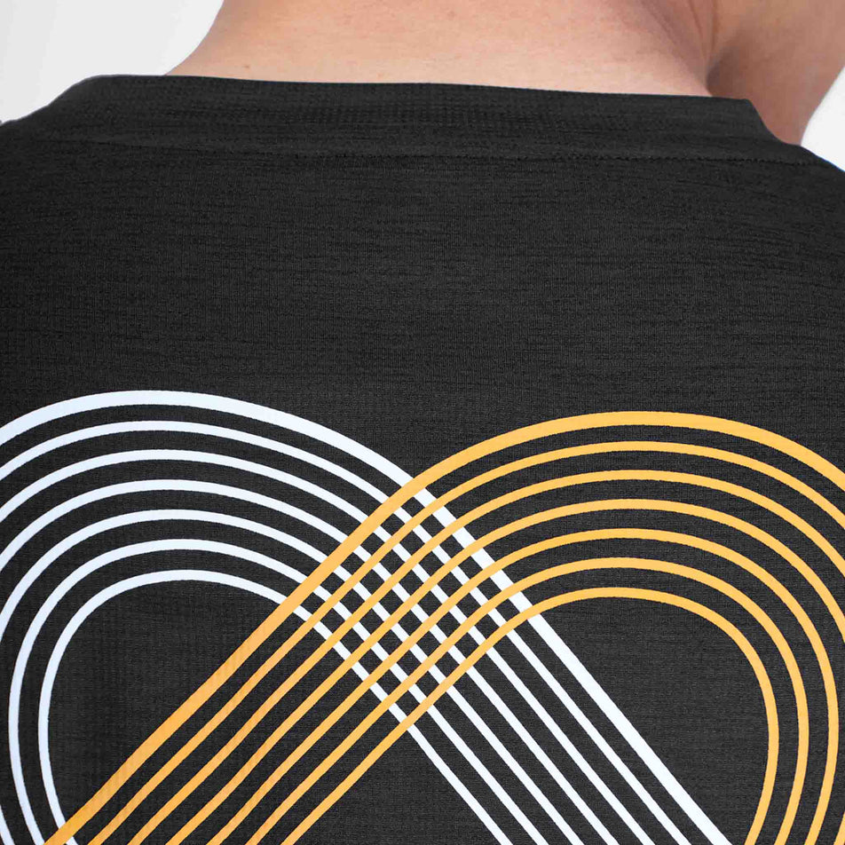 Close-up view of the graphic on the back of the SAYSKY Men's Statement Combat Pro T-Shirt in the Black colourway.