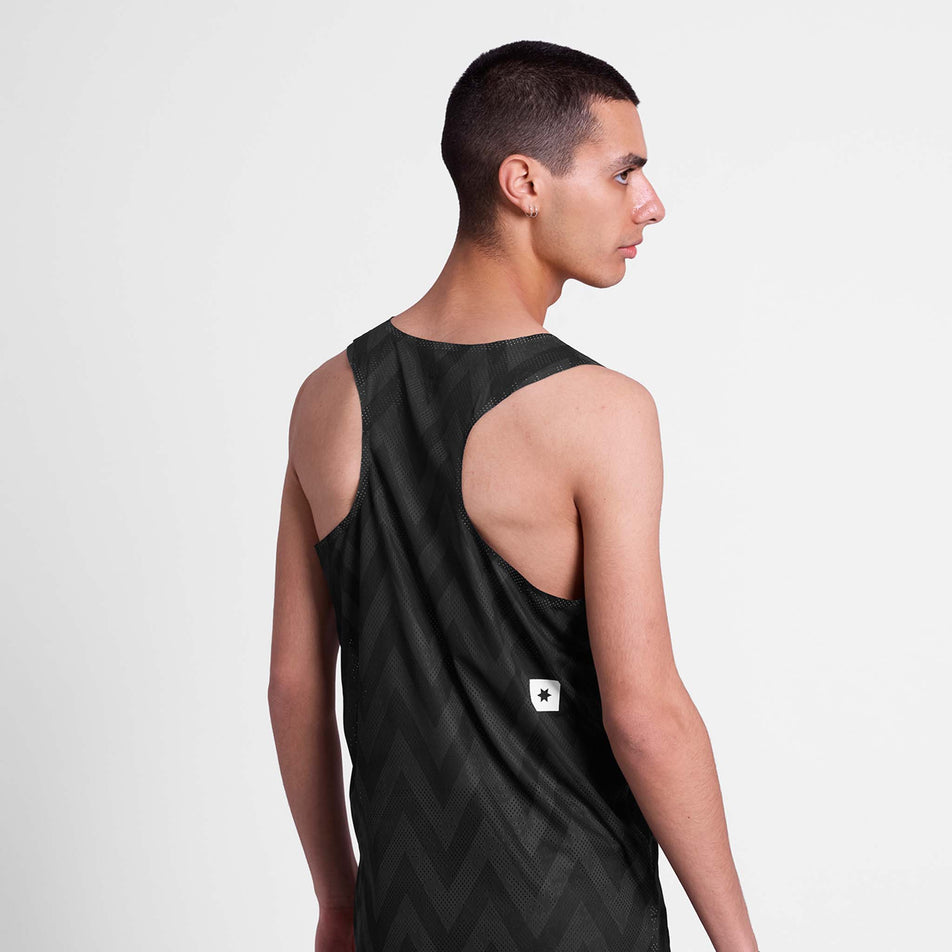 Back view of a model wearing the SAYSKY Men's Zig Zag Flow Air Singlet in the Black Zig Zag colourway.