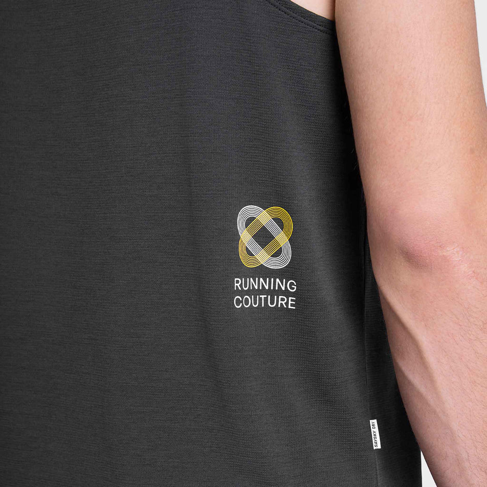 Close-up view of the logo on the back of the SAYSKY Men's Statement Combat Pro Singlet in the Black colourway.