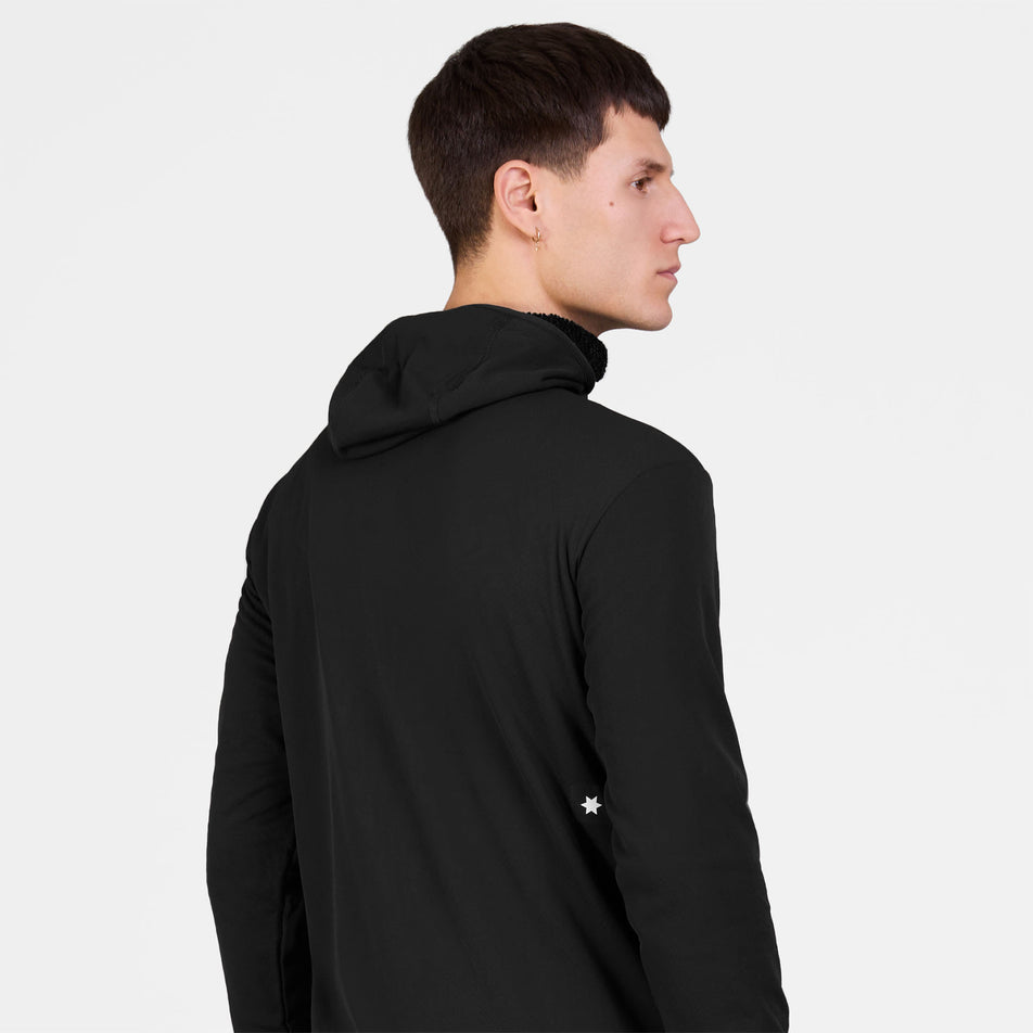 Back view of a model wearing the SAYSKY Men's Combat Half Zip Fleece Hoodie in the Black colourway.