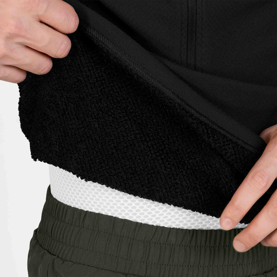 Close-up view of the inside of the SAYSKY Men's Combat Half Zip Fleece Hoodie in the Black colourway.