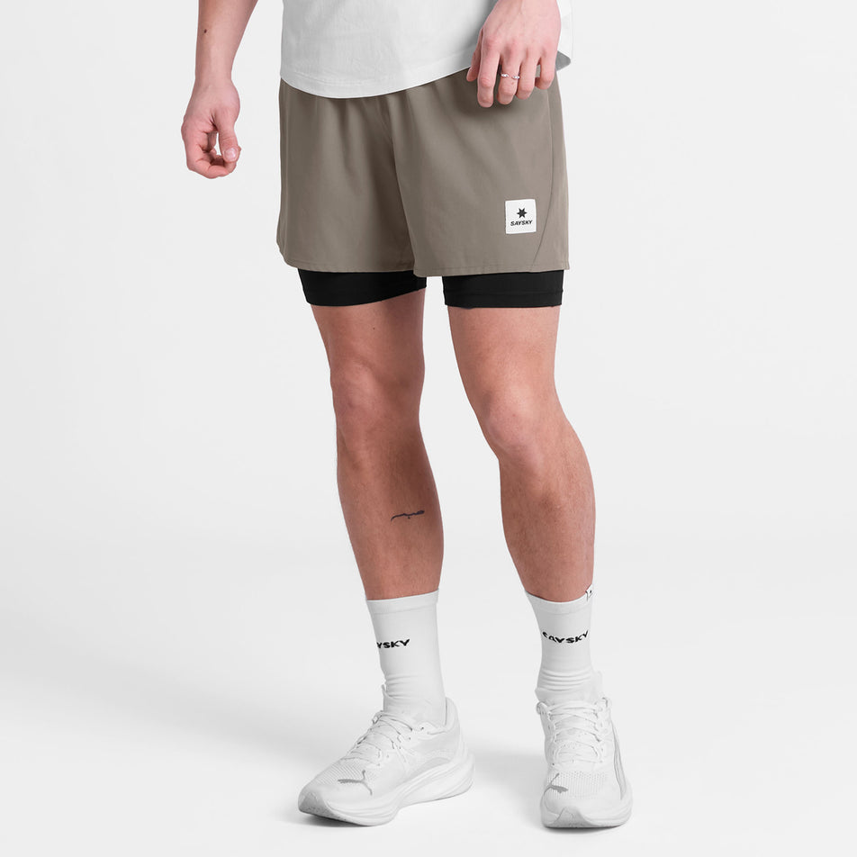 Front view of a model wearing the SAYSKY Men's Pace 2 In 1 Shorts 5