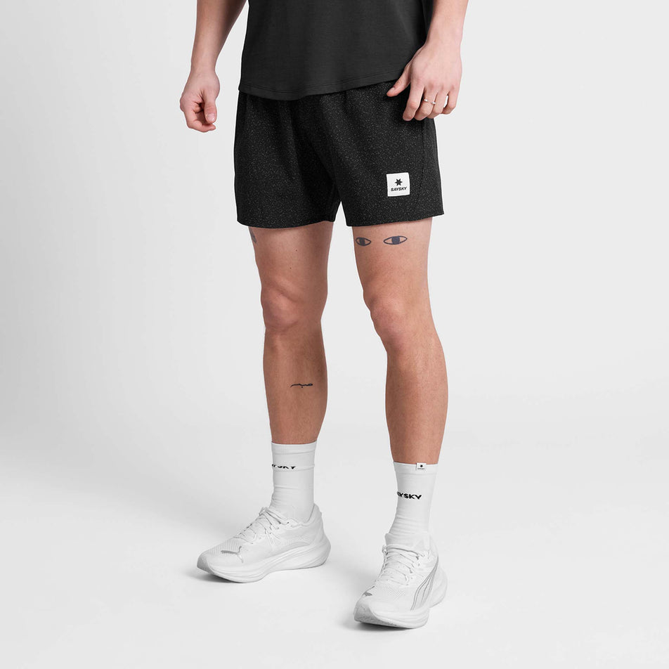 Front view of a model wearing the SAYSKY Men's Universe Pace Shorts 5