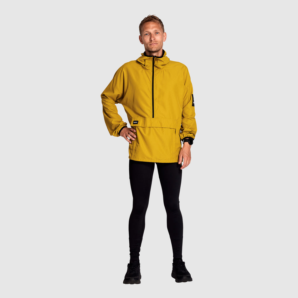 Front view of a model wearing the SAYSKY Men's Logo Motion+ Tights in the Black colourway.