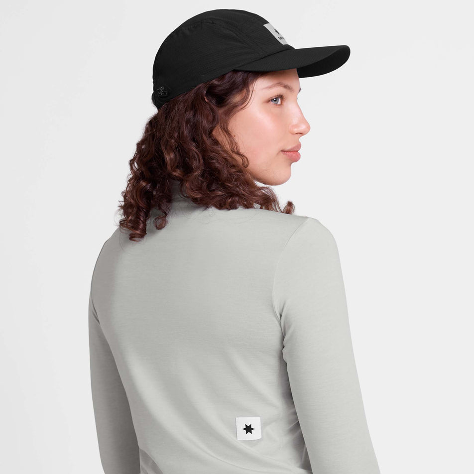 Back view of a model wearing the SAYSKY Women's Pace 1/2 Zip Long Sleeve in the Grey colourway.