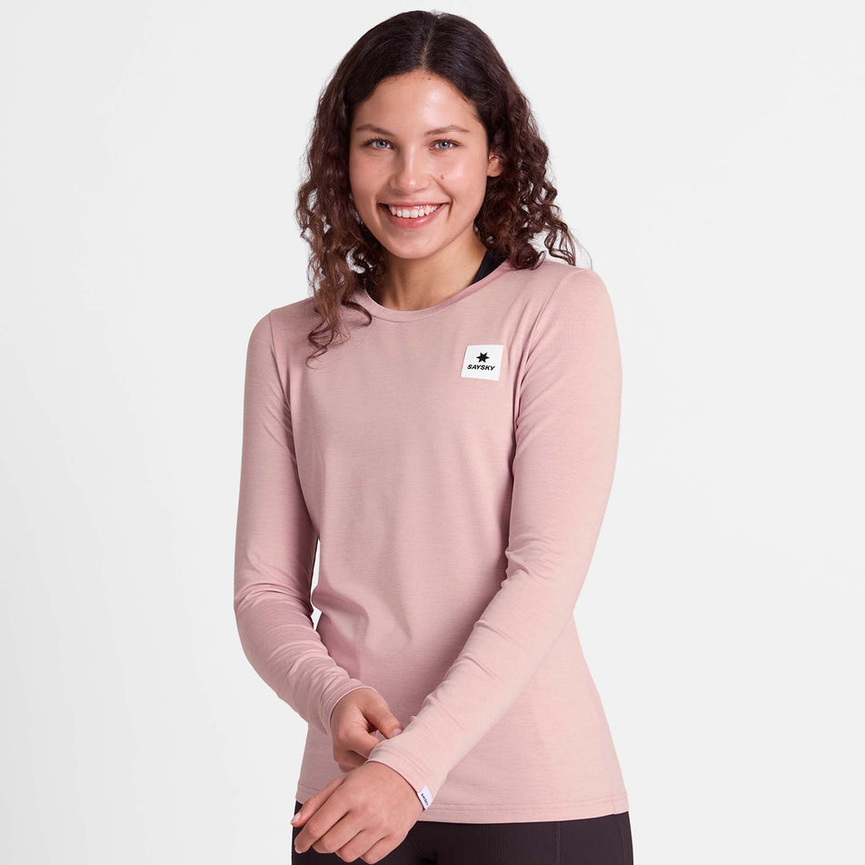 Front view of a model wearing the SAYSKY Women's Clean Pace Long Sleeve in the Pink colourway.