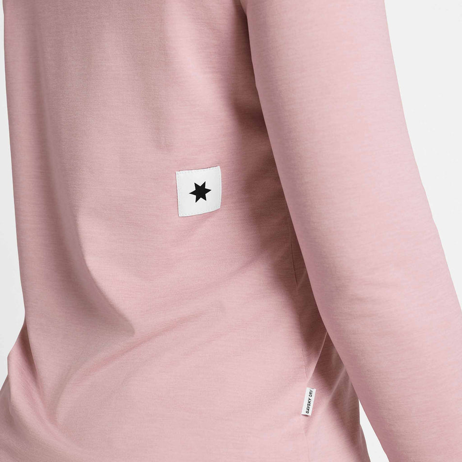 Close-up view of the SAYSKY logos on the SAYSKY Women's Clean Pace Long Sleeve in the Pink colourway.