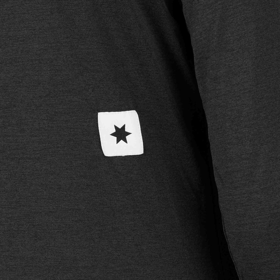 Close-up view of the SAYSKY logo on the SAYSKY Women's Clean Pace Long Sleeve in the Black colourway.