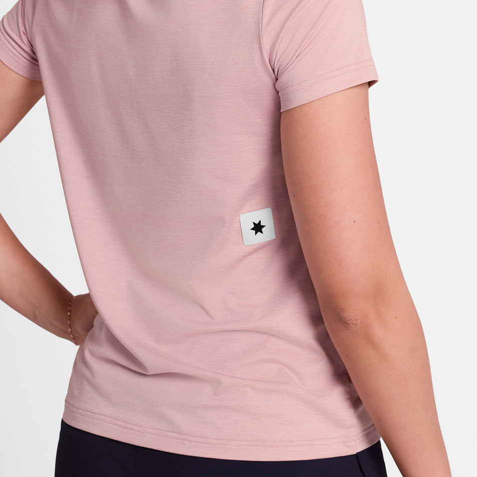 Back view of a model wearing the SAYSKY Women's Clean Pace T-Shirt in the Pink colourway.