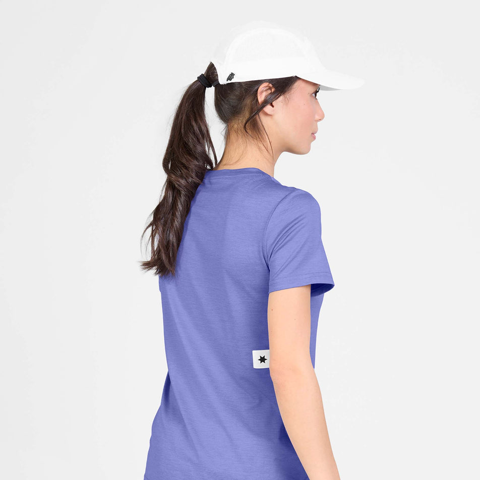 Back view of a model wearing the SAYSKY Women's Clean Pace T-Shirt in the Purple colourway.