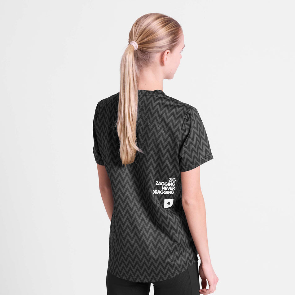 Back view of a model wearing the SAYSKY Women's Zig Zag Combat T-Shirt in the Black Zig Zag colourway.
