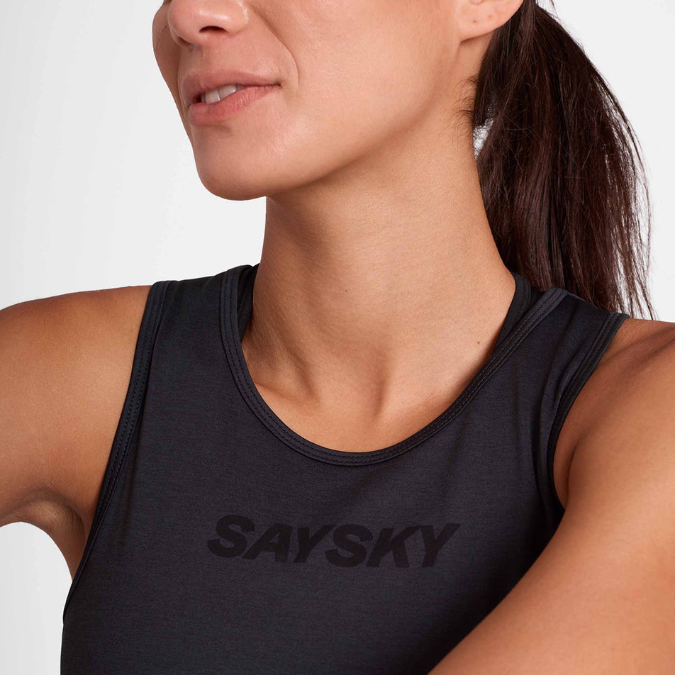 Front view of a model wearing the SAYSKY Women's Logo Pace Top in the Black colourway.