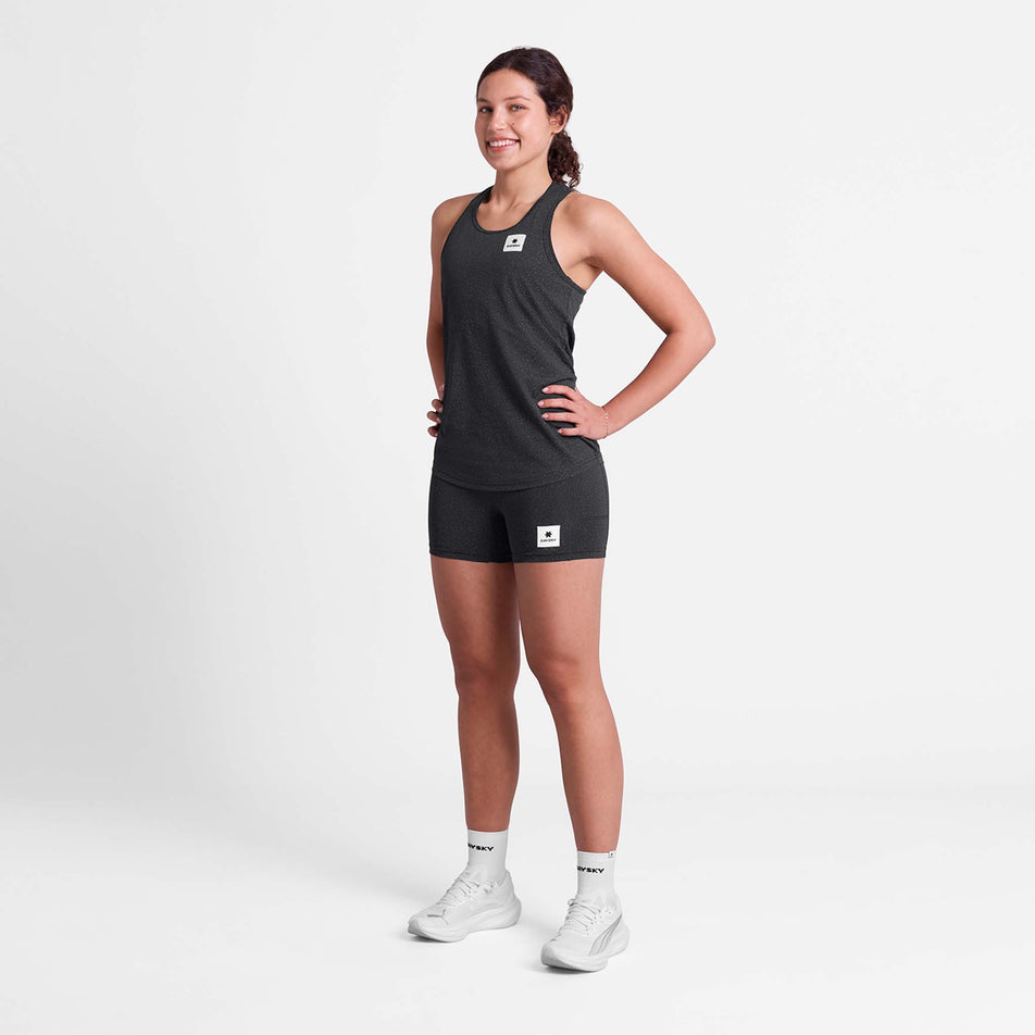 Front view of a model wearing the SAYSKY Women's Universe Combat Singlet in the Black Universe colourway.