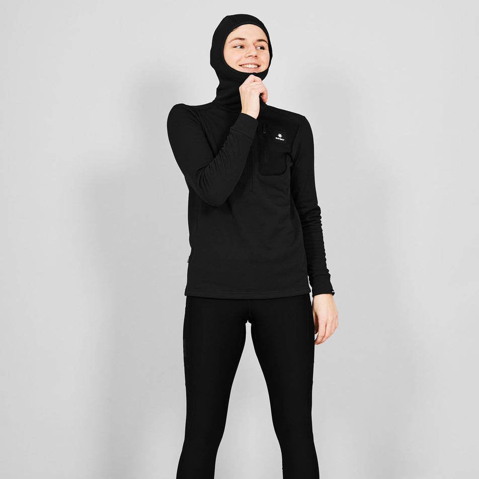 Front view of a model wearing the SAYSKY Combat Half Zip Fleece Hoodie in the Black colourway.