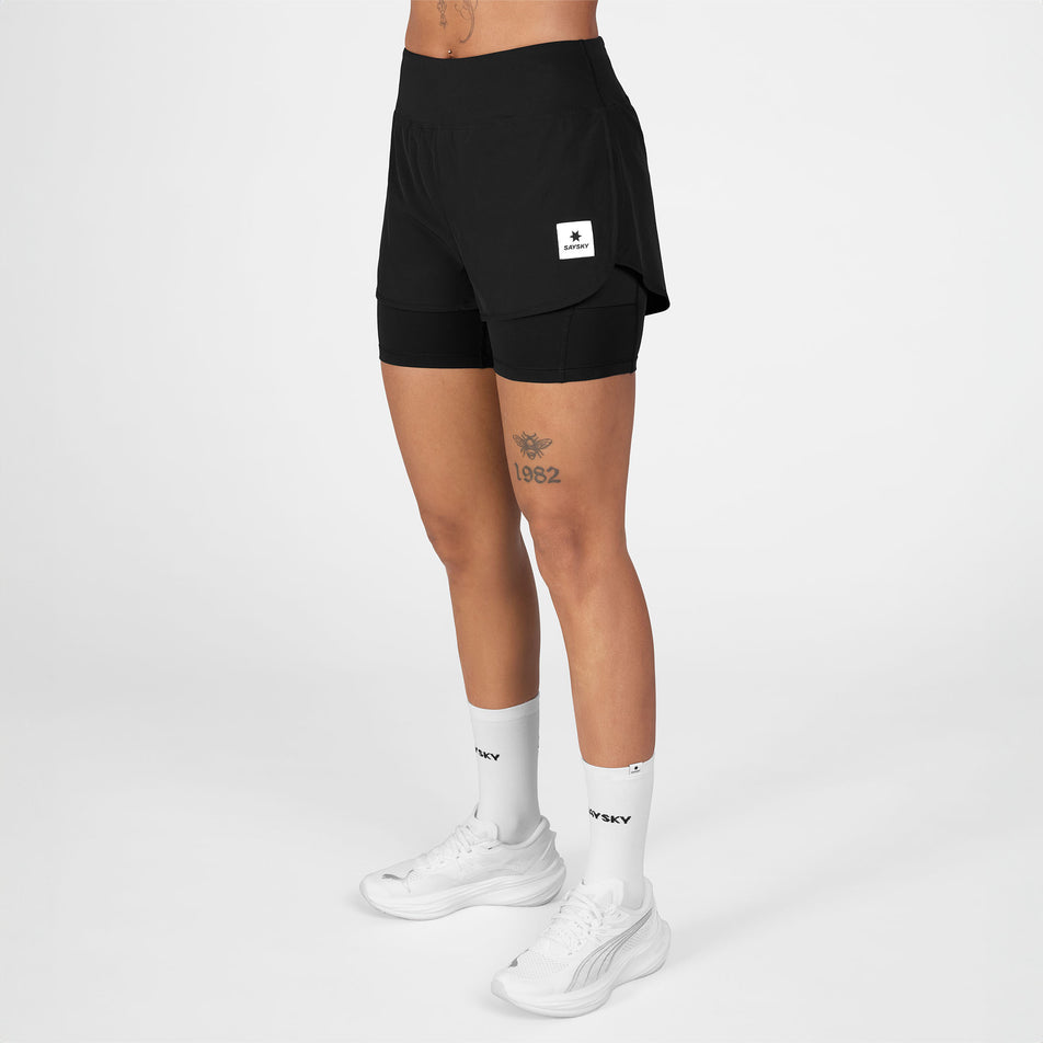 Front view of a model wearing the SAYSKY Women's 2 In 1 Pace Shorts 3