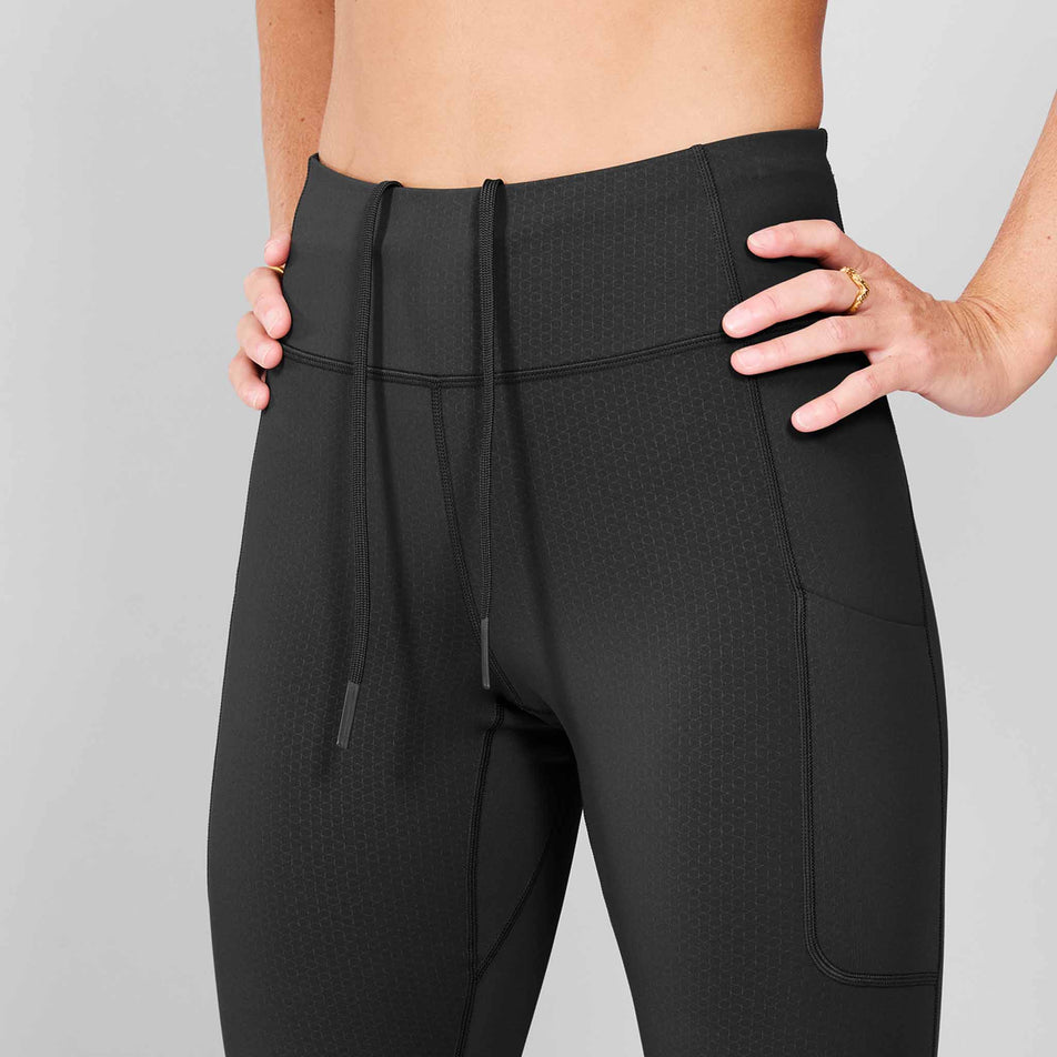 Front view of a model wearing SAYSKY Women's Combat+ Long Tights in the Black-26 colourway.