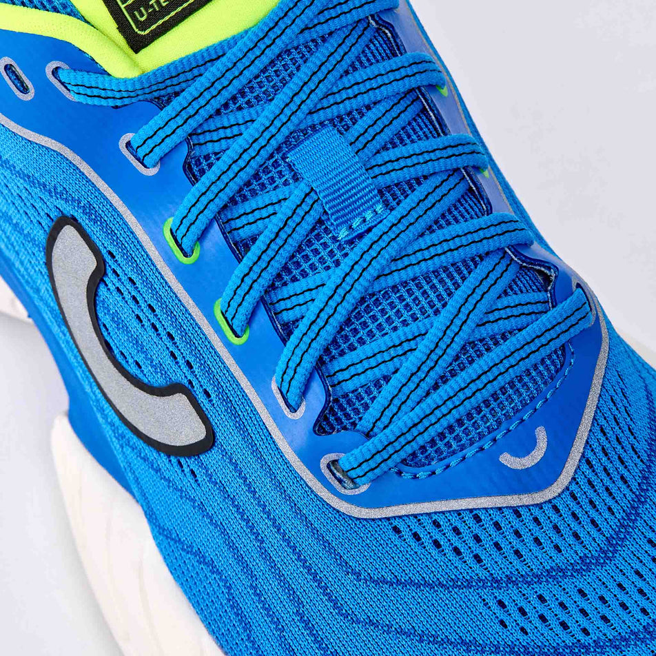 The upper of the right shoe from a pair of True Motion Men's U-Tech Nevos 4 Running Shoes in the French Blue/Skydiver/Safety Yellow colourway.