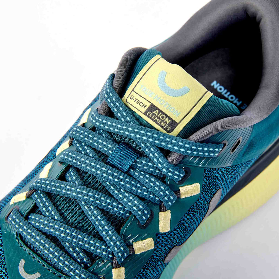 The upper of the right shoe from a pair of True Motion Women's U-Tech Aion Elements Running Shoes in the Mediterranea/Iron Gate Aquatic colourway.