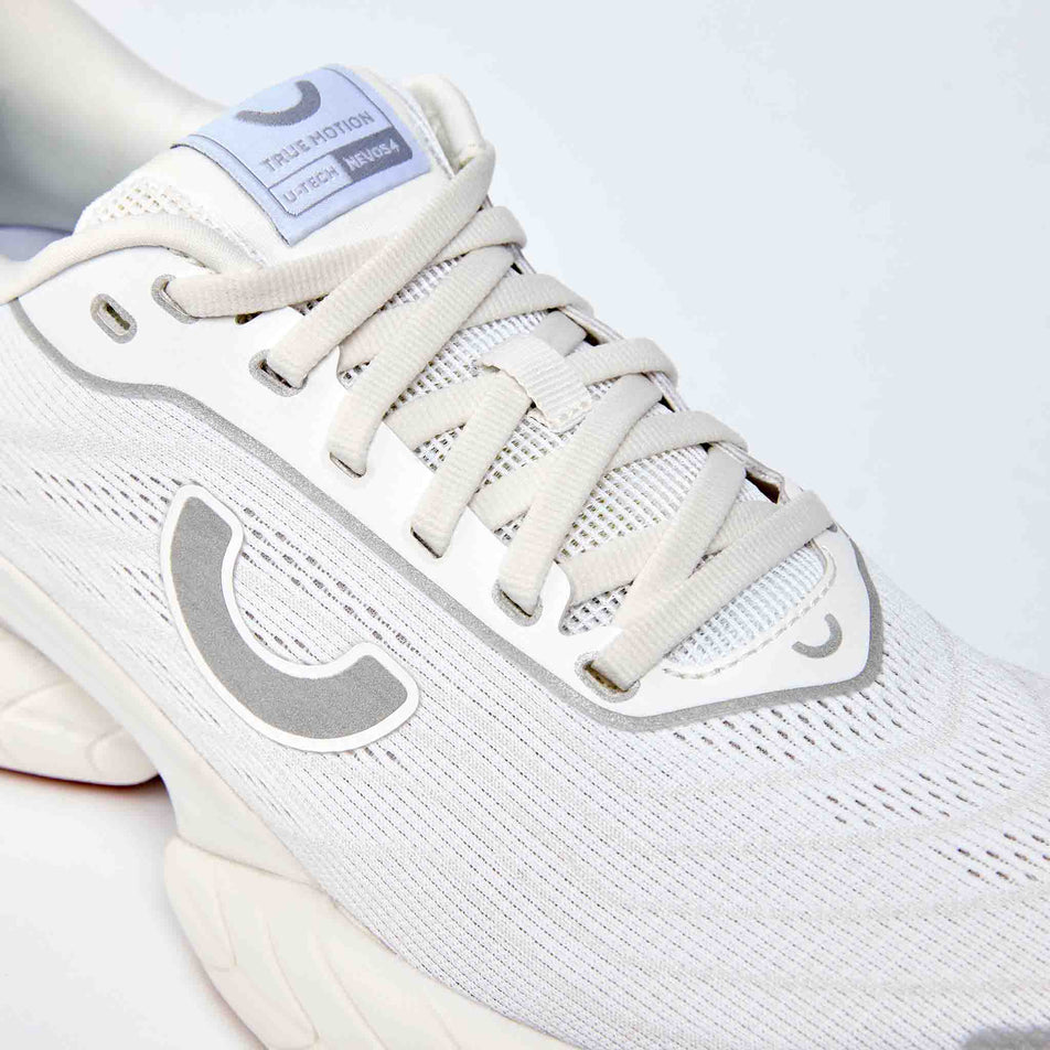 The upper of the right shoe from a pair of True Motion Women's U-Tech Nevos 4 Running Shoes in the White/Bright White colourway.