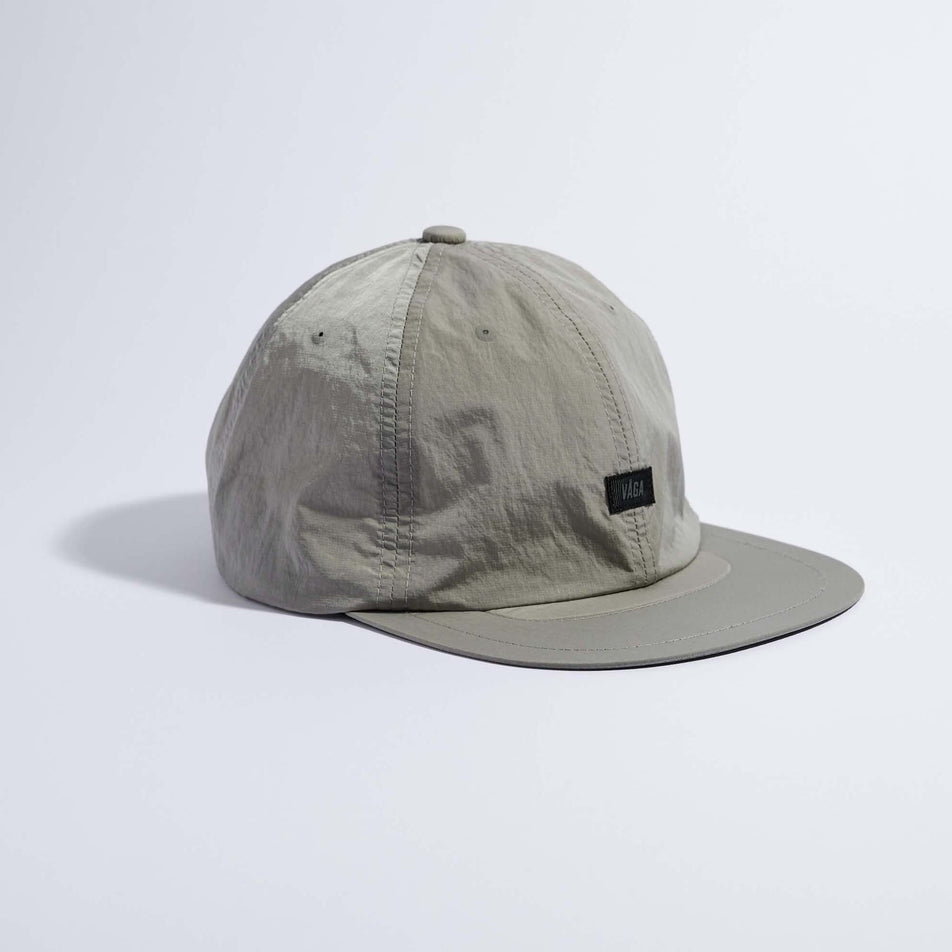 Angled view of the VAGA Unisex Drift Cap in the Mid Grey colourway.
