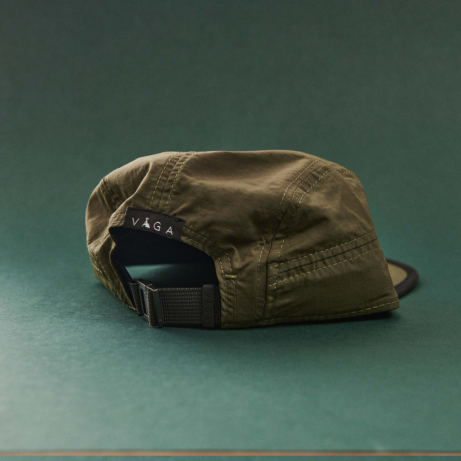 Back view of a VAGA Unisex Fell Cap in the Utility Green/Black/Navy colourway (8217264029858)