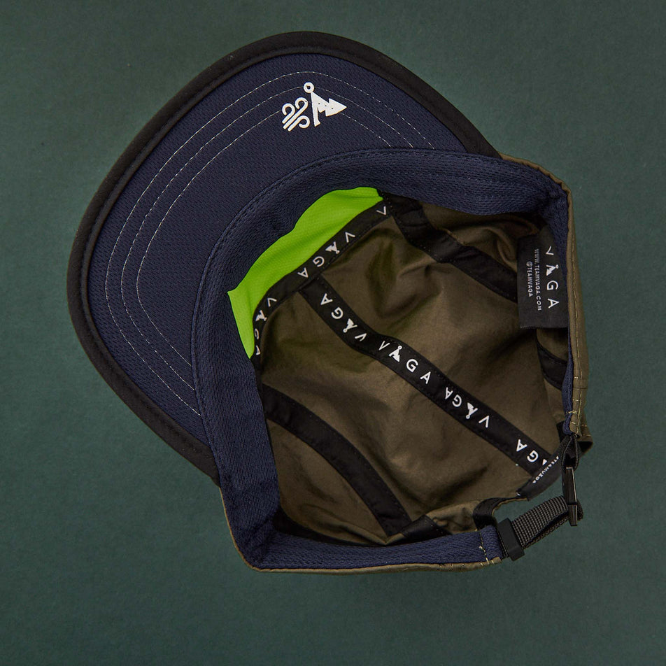 View of the inside of a VAGA Unisex Fell Cap in the Utility Green/Black/Navy colourway (8217264029858)