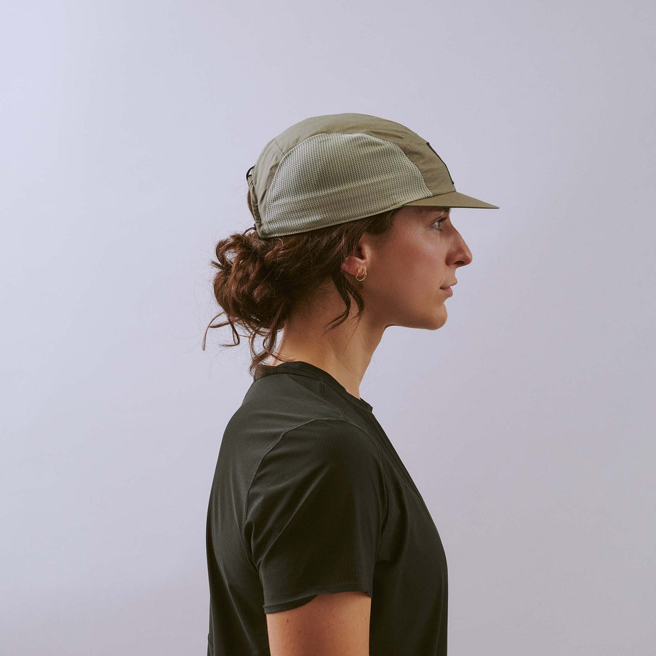 Side view of a model wearing the VÅGA Unisex Mesh Flex Cap in the Mid Grey colourway.