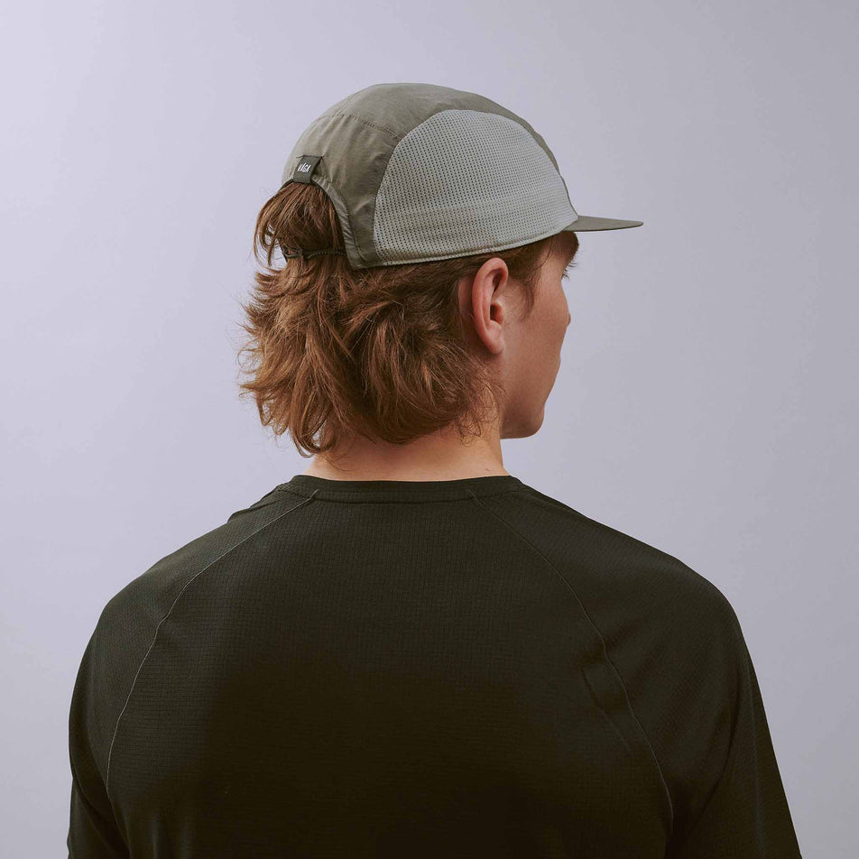 Back view of a model wearing the VÅGA Unisex Mesh Flex Cap in the Mid Grey colourway.