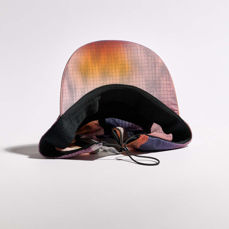 The underside of the VÅGA Unisex Night Club Cap 2.0 in the Sunset colourway.