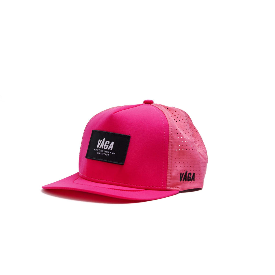 The front of a VÅGA Unisex Trucker Cap in the Neon Pink/Navy Blue colourway. (8596201898146)