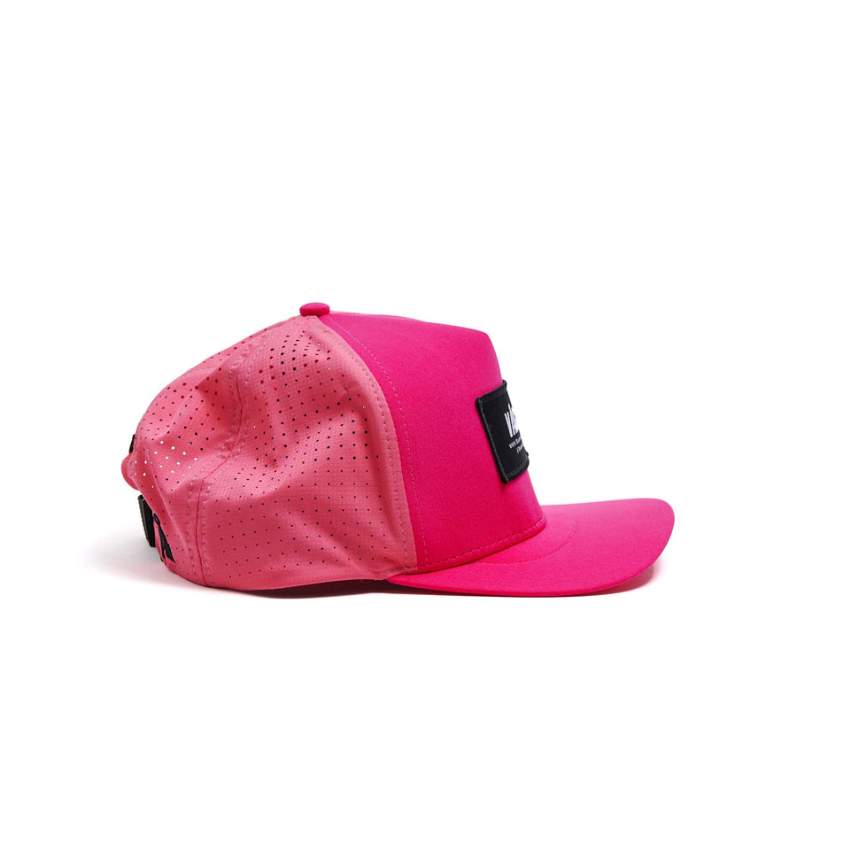 The right-side of a VÅGA Unisex Trucker Cap in the Neon Pink/Navy Blue colourway. (8596201898146)