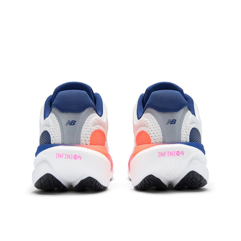 The back of a pair of New Balance Women's 1080 V15 Running Shoes in the Sea Salt/Blue Oyster colourway.