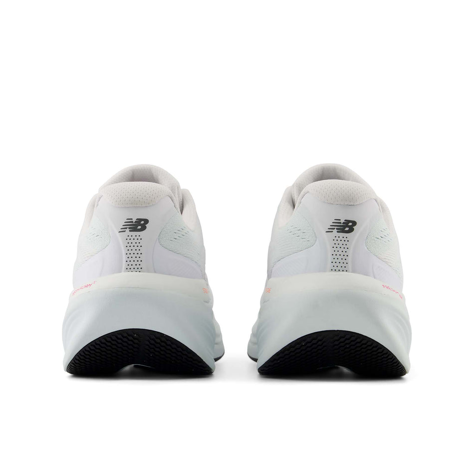 The back of a pair of New Balance Women's Fresh Foam X 860 V15 Running Shoes in the White/Pink Heat colourway.