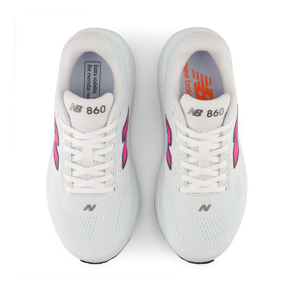 The uppers of a pair of New Balance Women's Fresh Foam X 860 V15 Running Shoes in the White/Pink Heat colourway.