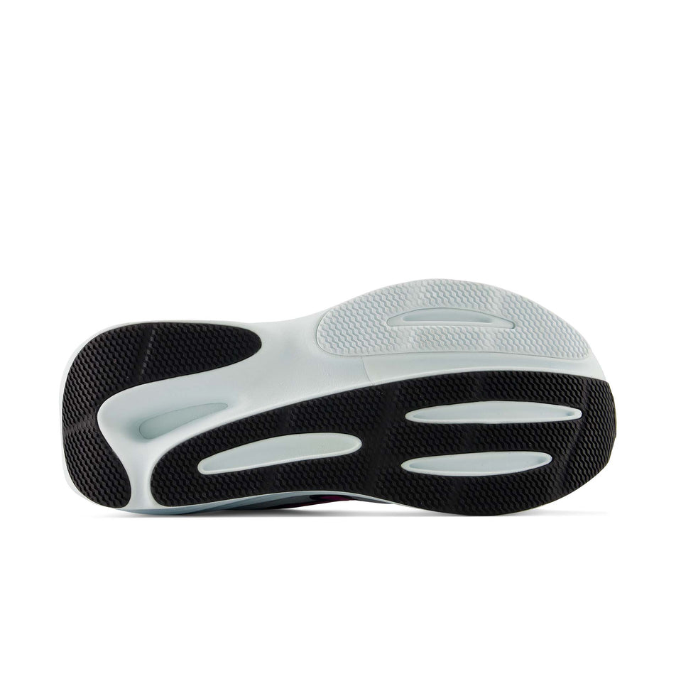 The outsole of the right shoe from a pair of New Balance Women's Fresh Foam X 860 V15 Running Shoes in the White/Pink Heat colourway.