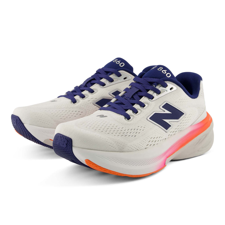 A pair of New Balance Women's Fresh Foam X 860 V15 Running Shoes in the Sea Salt/Blue Oyster colourway.