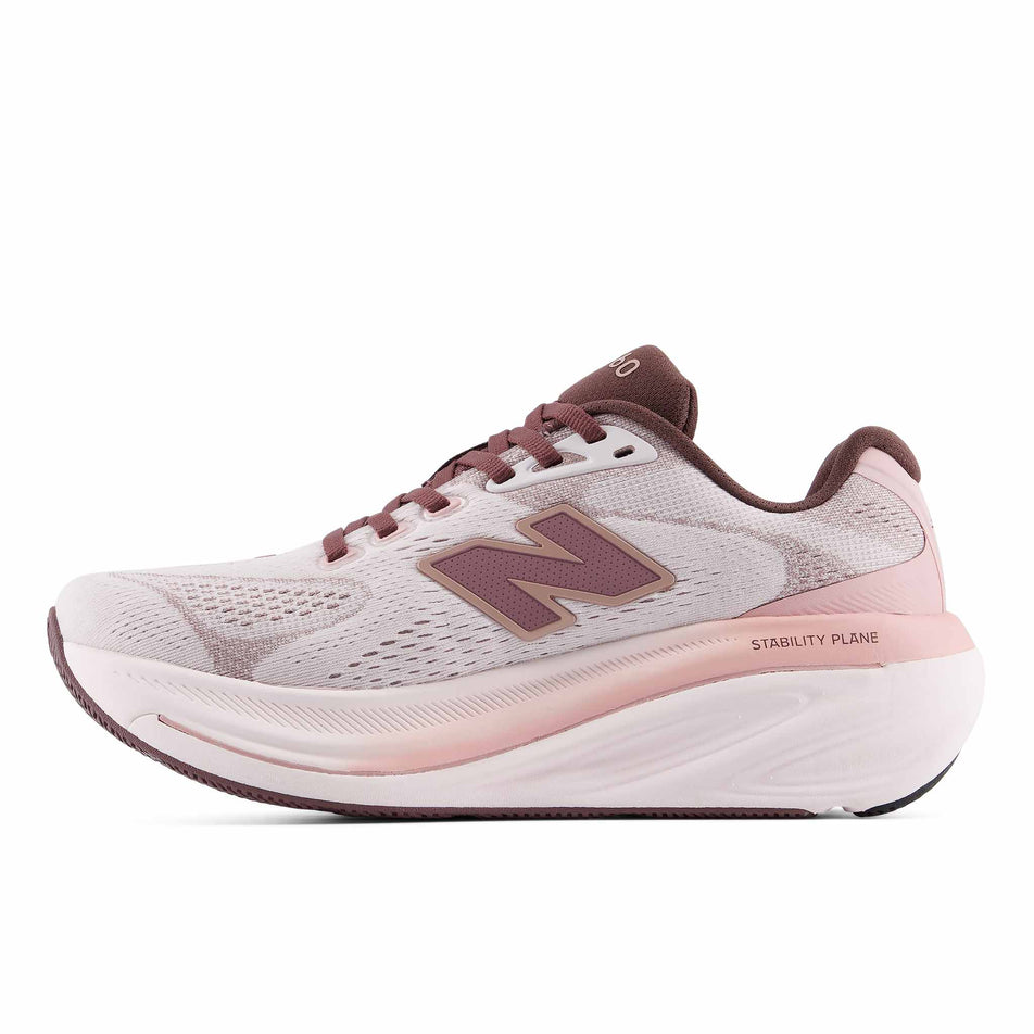 Medial view of the right shoe from a pair of New Balance Women's Fresh Foam X 860 V15 Running Shoes in the Pink Salt/Pebble colourway.
