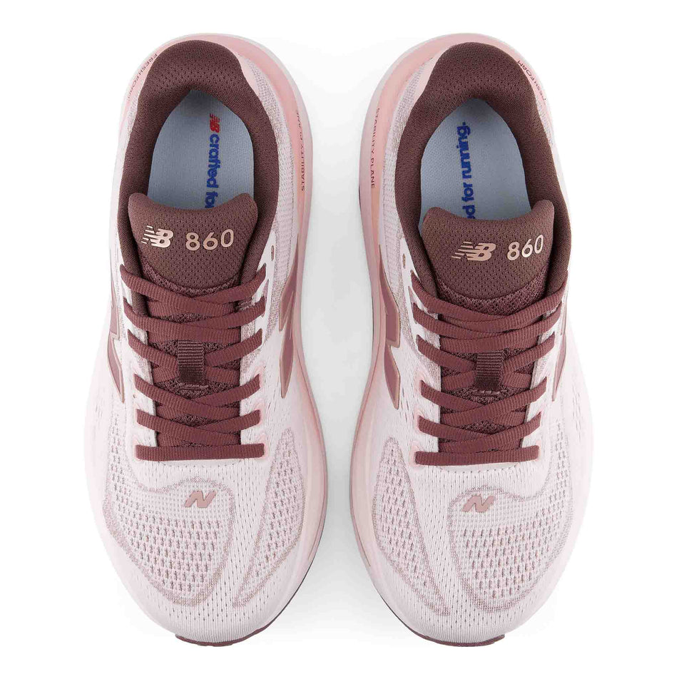 The uppers of a pair of New Balance Women's Fresh Foam X 860 V15 Running Shoes in the Pink Salt/Pebble colourway.