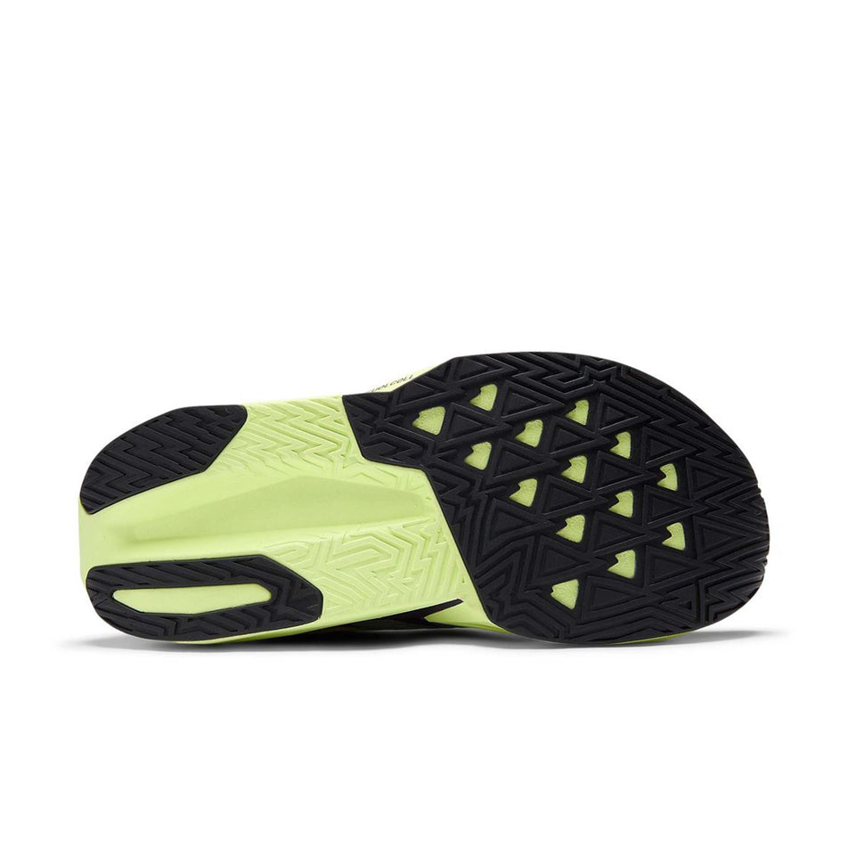 The outsole of the right shoe from a pair of New Balance Women's Fuelcell Rebel V5 Running Shoes in the Alkaline Green/Boysenberry colourway.