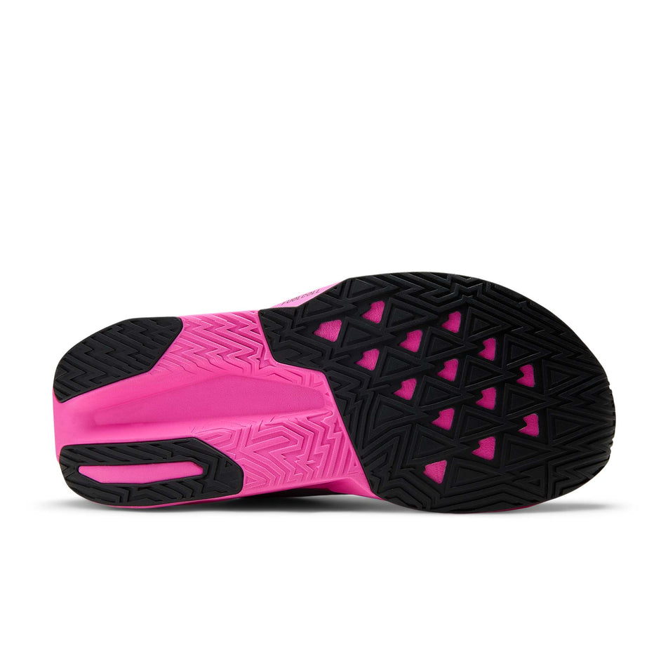 The outsole of the right shoe from a pair of New Balance Women's Fuelcell Rebel V5 Running Shoes in the Pink Heat/Rosewood colourway.